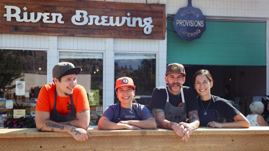 The Kettle River Brewing Co team standing out front of their location on Baillie Ave.