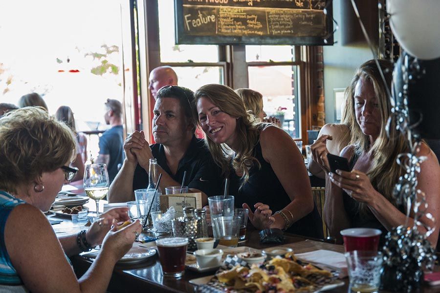 People enjoying a meal at The Train Station Pub - 1177 Ellis St