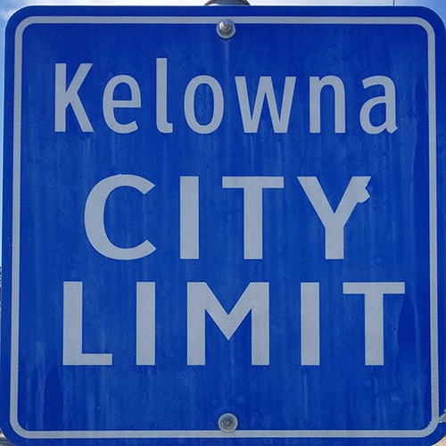 Kelowna City Limit blue road sign found at Kelowna city boundaries