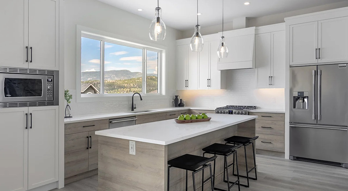 L-shaped kitchen design in Kuipers Peak duplex townhomes for sale in Kelowna, BC, Canada