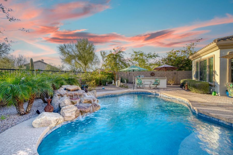 Backyard with Pool and Sunset Sky.