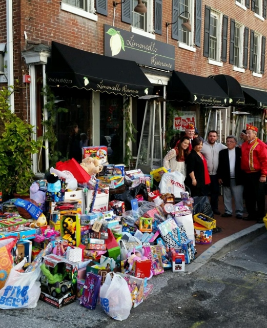 Mingrino Family, owners of Limoncello, with all of the toys donated