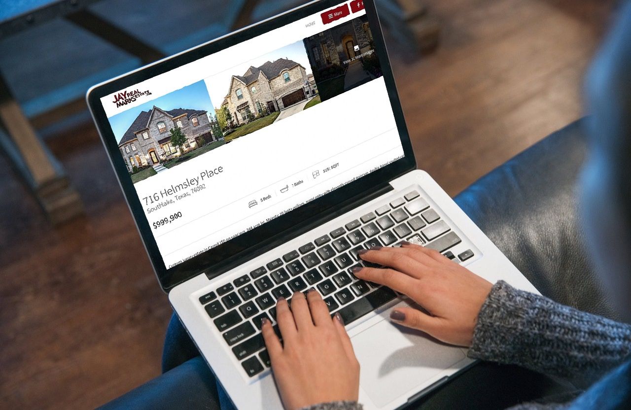 Laptop showing property website
