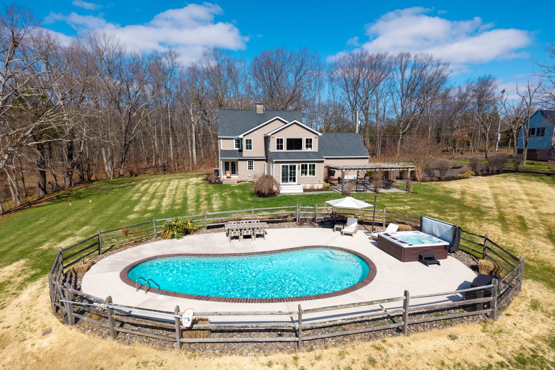 Saltwater pool and backyard with barn