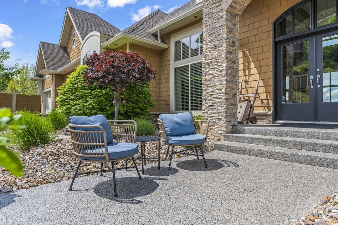 Glass-railed deck with valley views
