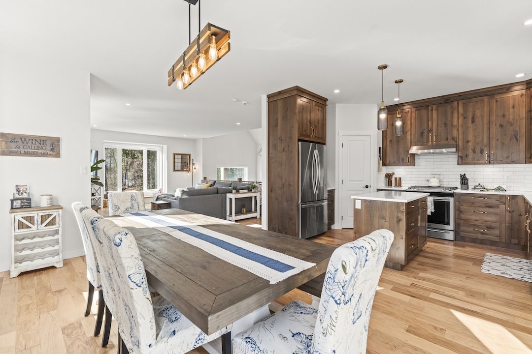Kitchen with alder cabinetry and quartz counters