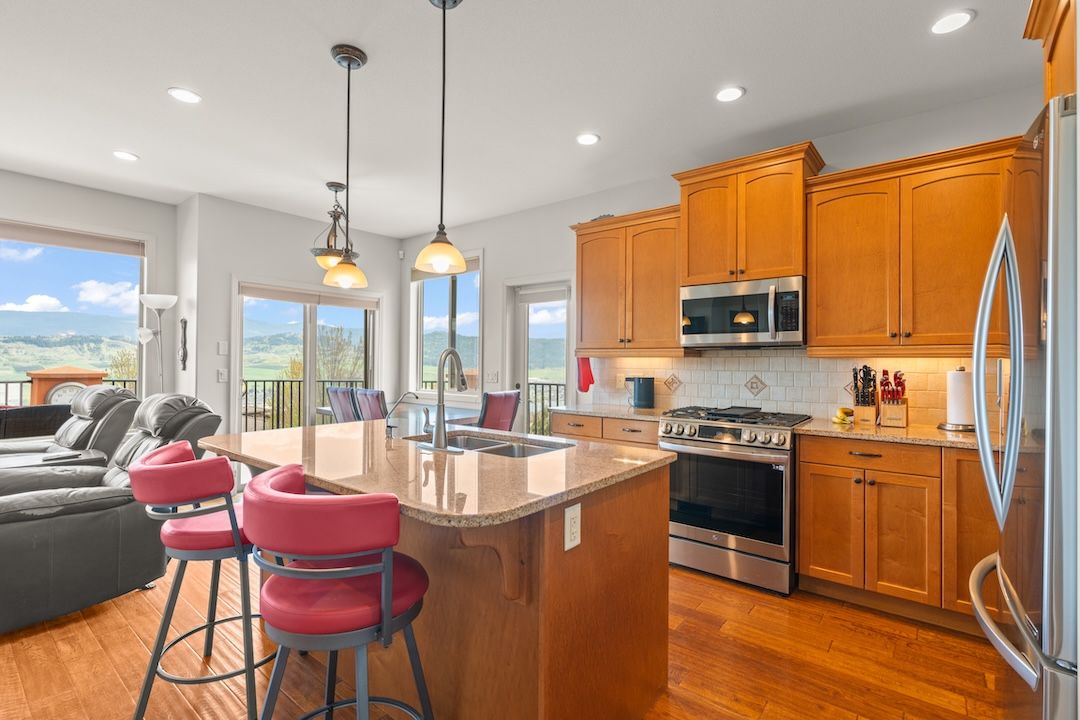 Kitchen — open to great room with lake view