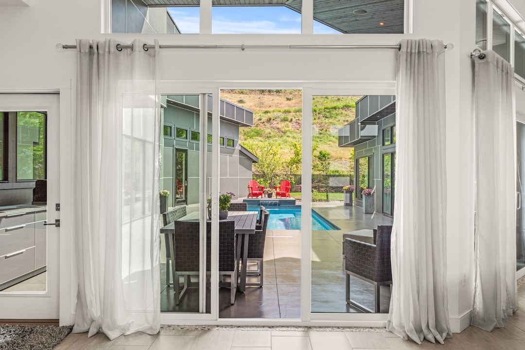 Open living looking through to the courtyard pool