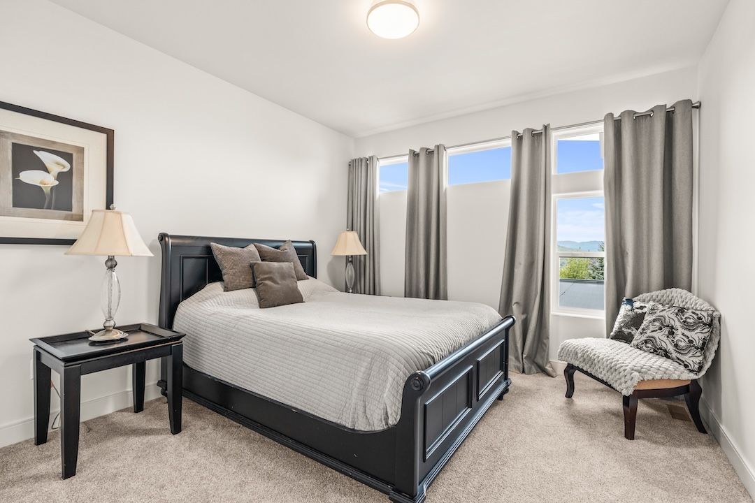 One of the three upper-level bedrooms