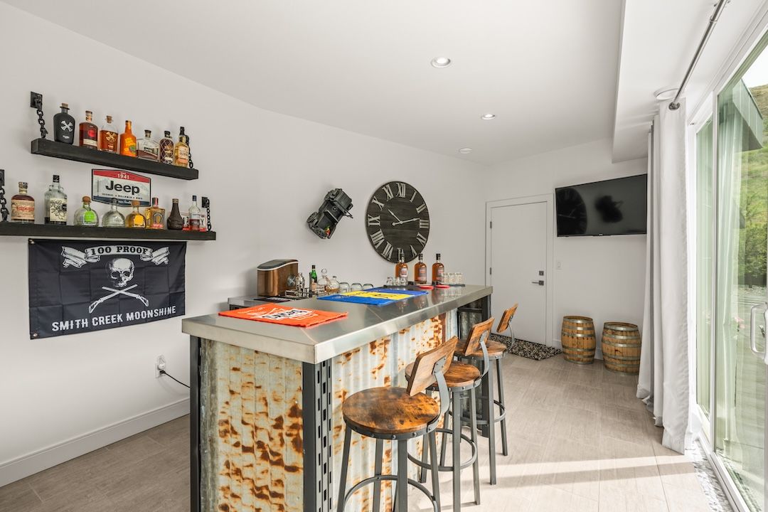 Bar area with dual sliders opening to the courtyard