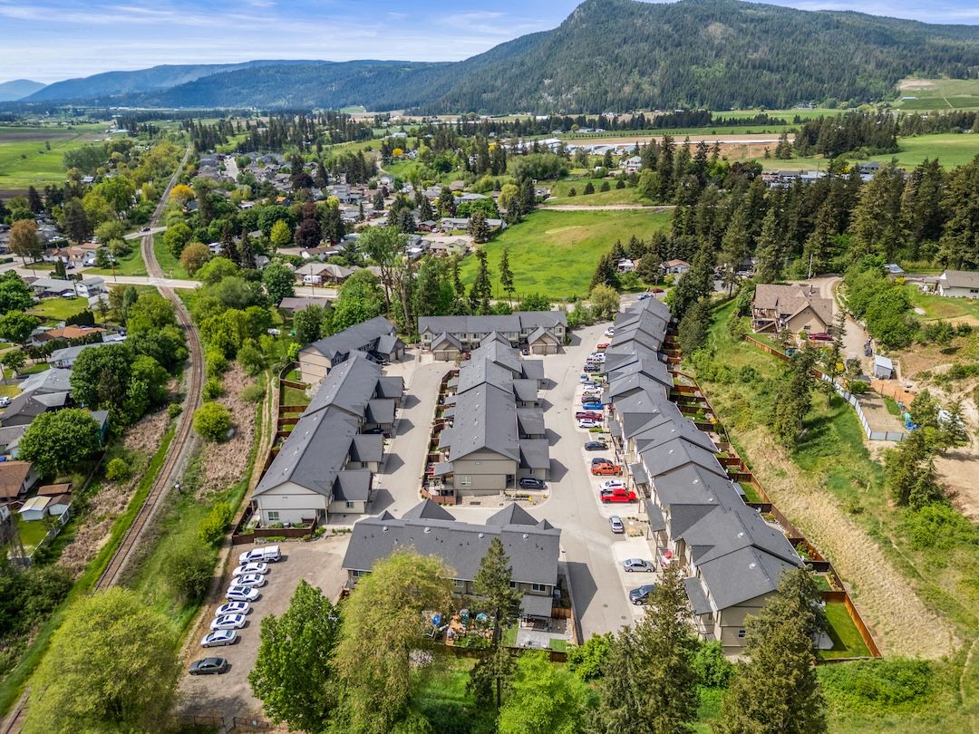Aerial view of the complex with mountains in the distance