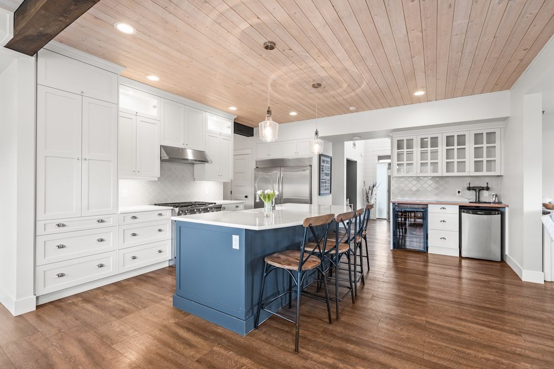Wide view of the kitchen, dining, and living at 4160 Noble Road