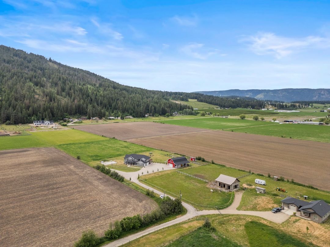 Aerial view of the 4.5 acres at 4160 Noble Road with Swanson Mountain beyond