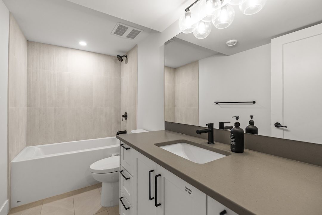 Basement four-piece bathroom (virtually staged)