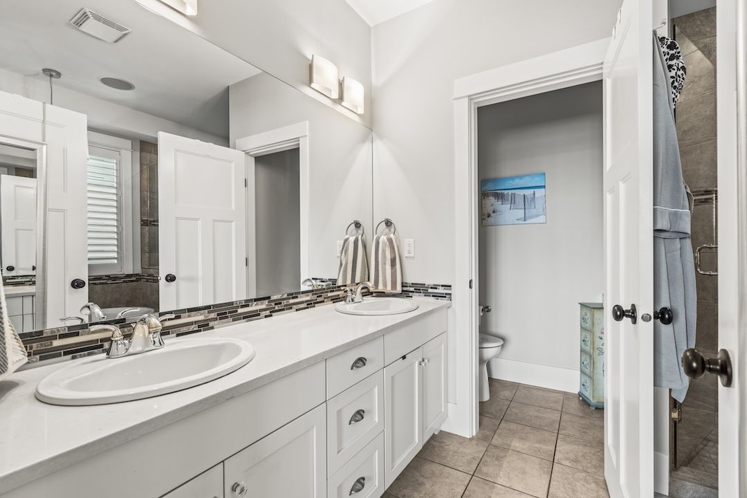 Five-piece primary ensuite with soaker tub