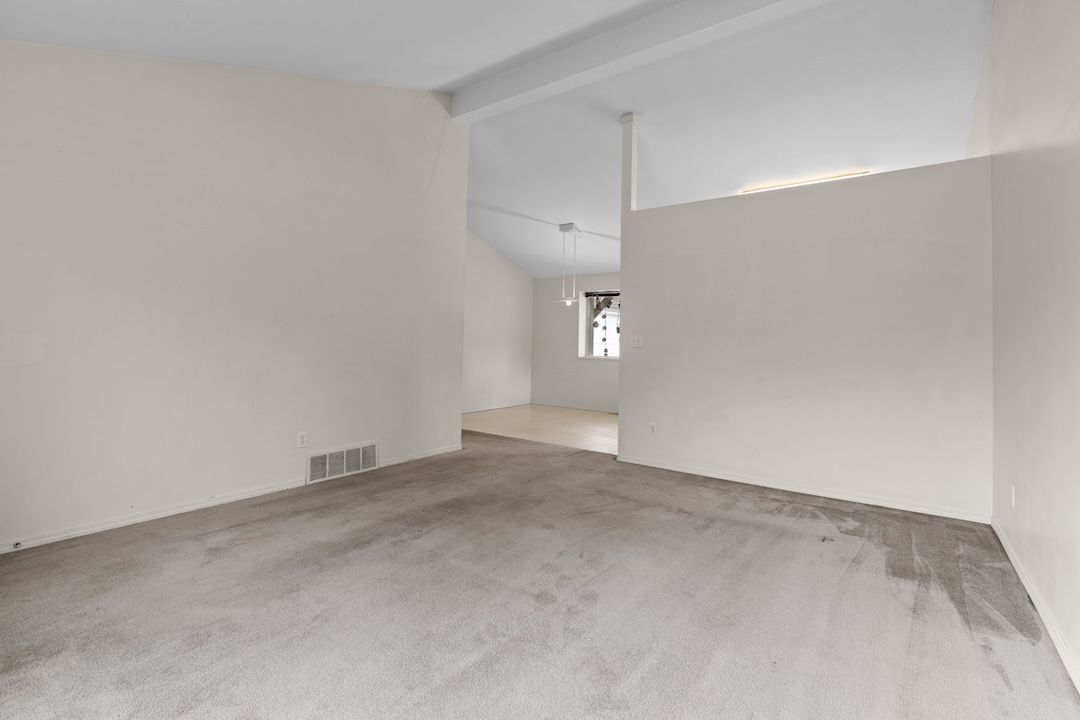 Living area opening to the kitchen
