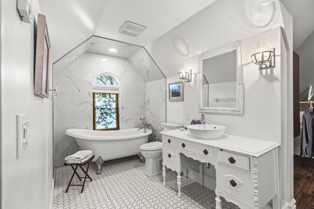Third-floor ensuite with freestanding soaker tub