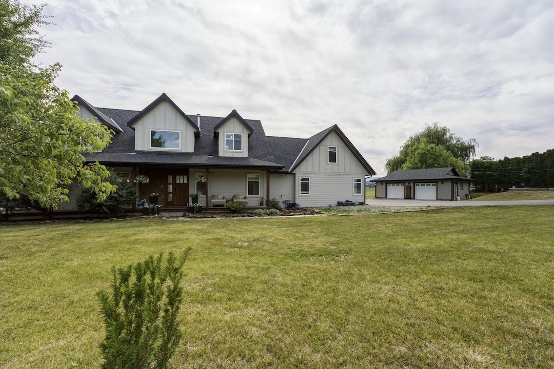 Wide view of the home and yard, as featured in the info booklet