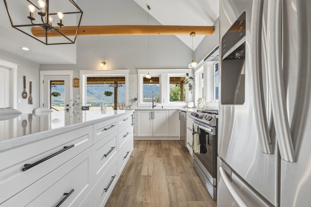 Kitchen with oversized island and countryside views through the windows