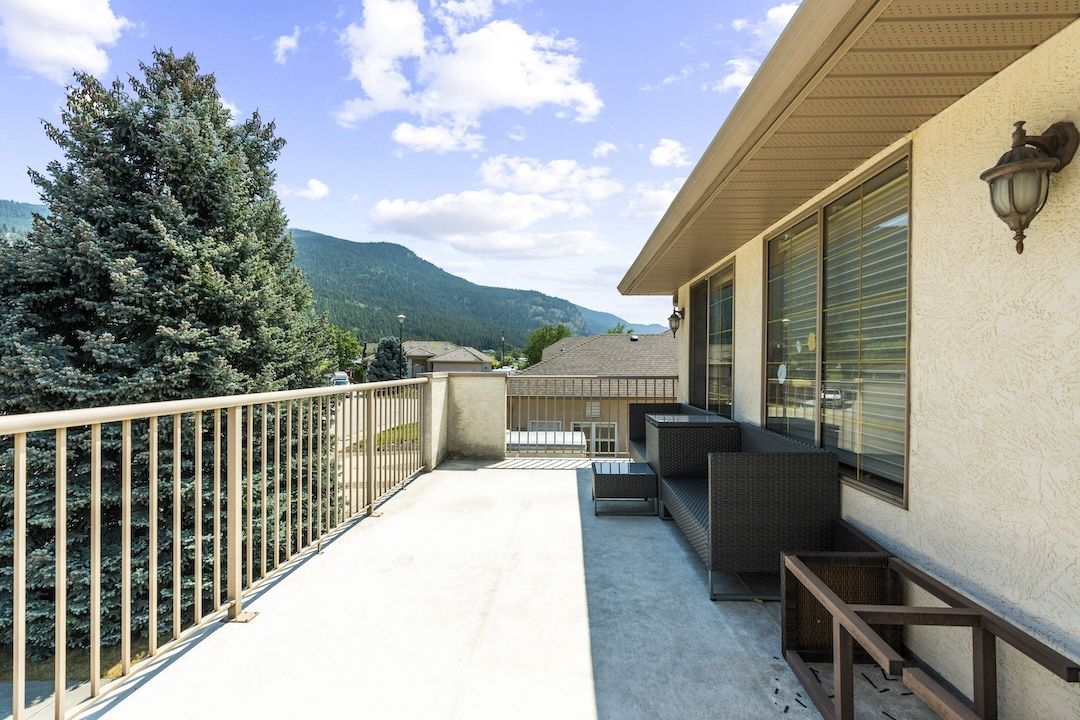 Front deck with valley and mountain views at 2068 Hunter Crescent