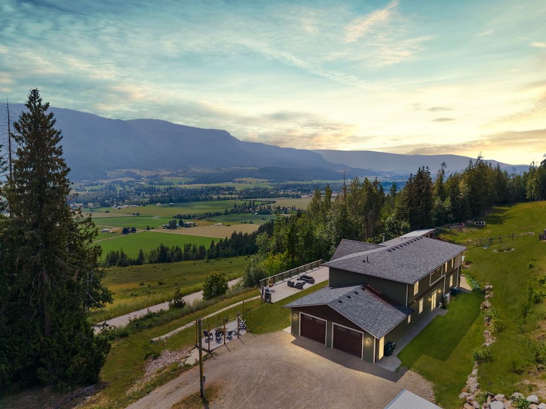 Twilight aerial of the property and valley
