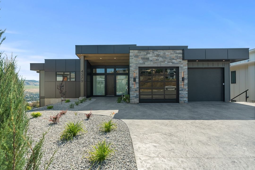 Daytime exterior of 4379 Painted Turtle Drive showing the home's modern architecture and clean lines