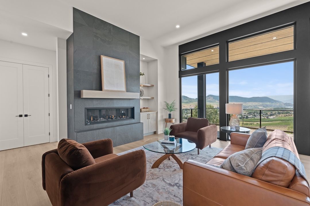 Main living space with soaring ceilings and walls of windows