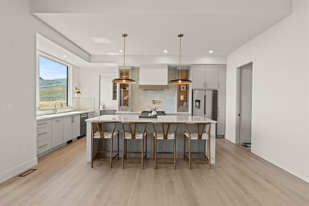 Kitchen with island and high ceilings