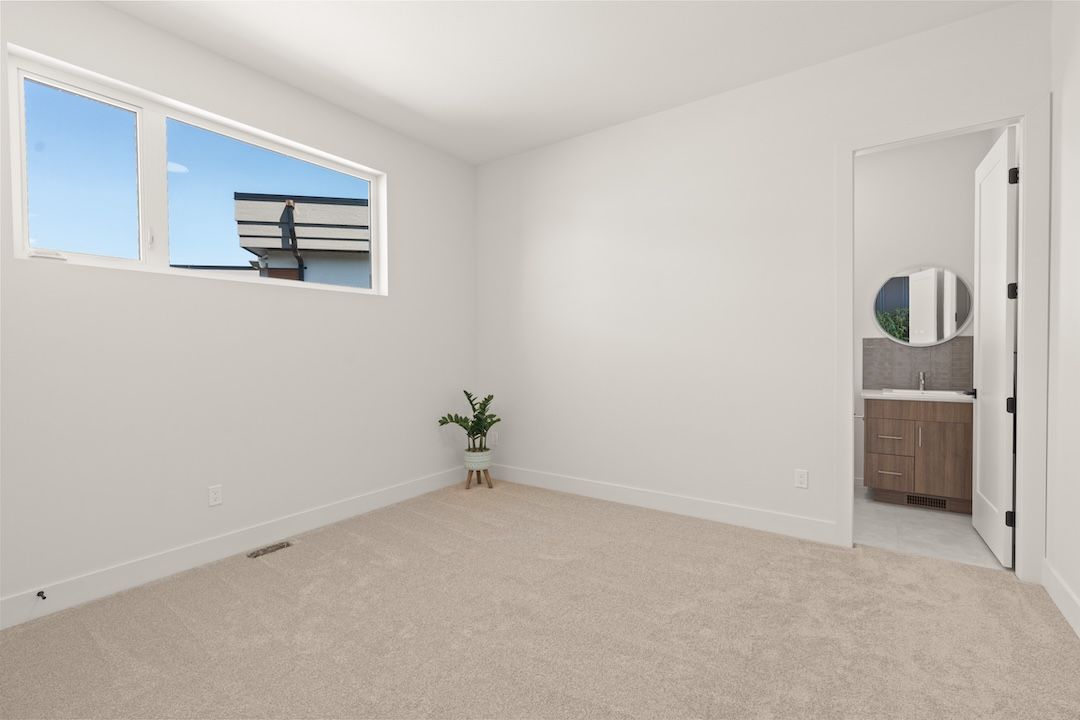Second main-level bedroom with its own ensuite