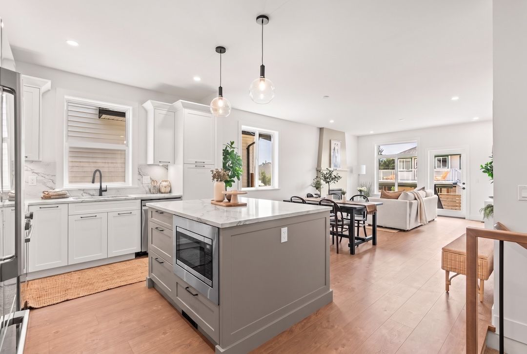 Open kitchen, dining, and great room on the main floor