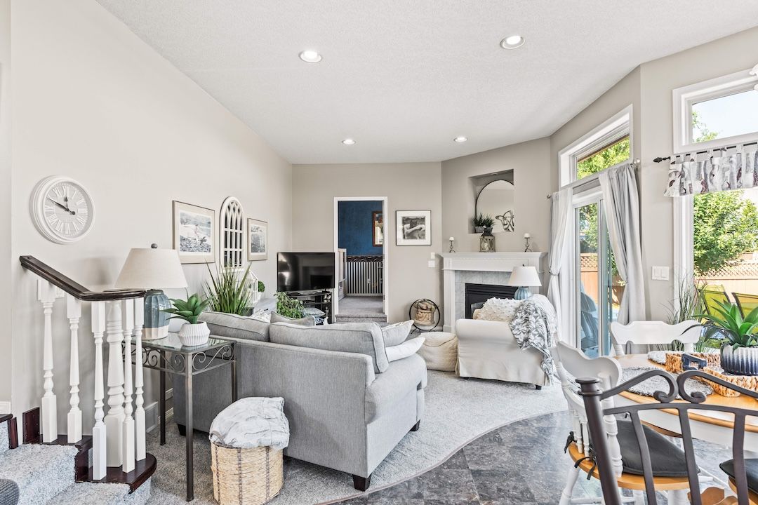 Open great room with gas fireplace off the kitchen at 2302 Maundrell Avenue