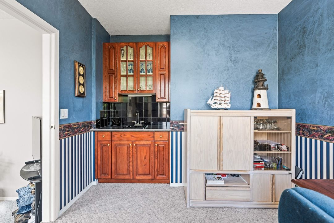 Main-floor den and office with wet bar