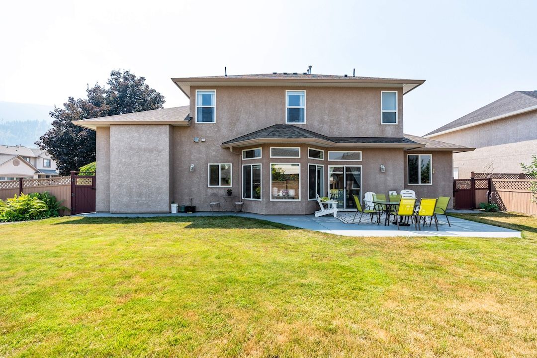 Private fenced backyard with patio at 2302 Maundrell Avenue