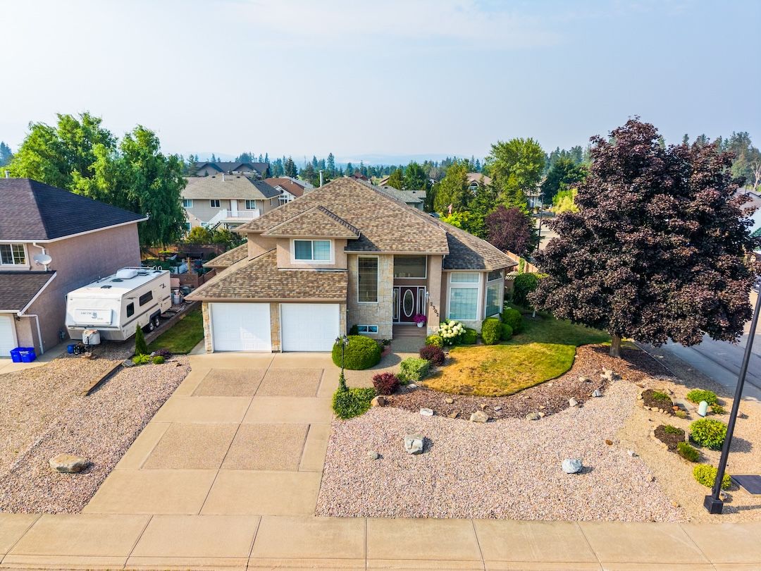 Aerial view of the landscaped corner lot at 2302 Maundrell Avenue in its Armstrong neighbourhood