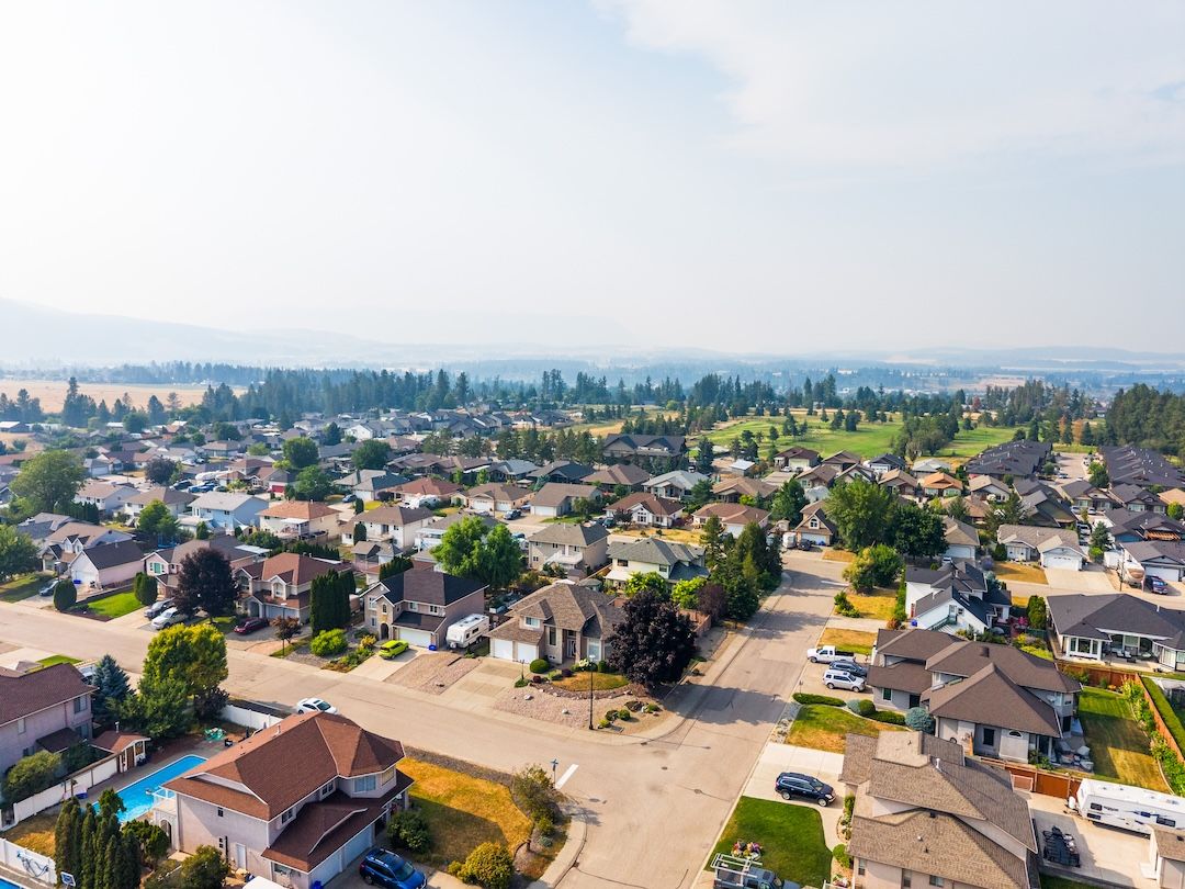 Aerial view showing 2302 Maundrell Avenue within the Armstrong neighbourhood and surrounding valley