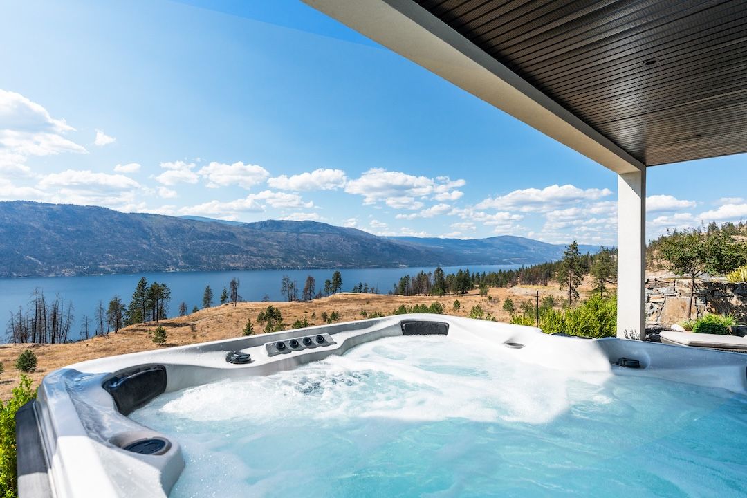 Arctic Spa hot tub on the lower patio overlooking Okanagan Lake