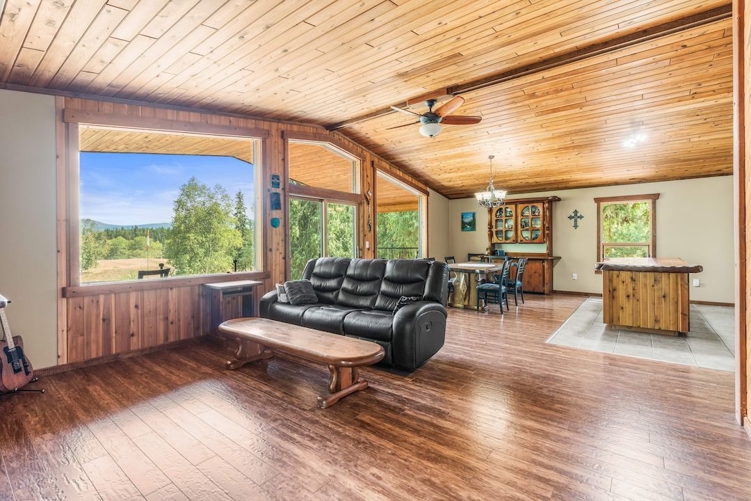 Vaulted knotty cedar ceiling over the open living room at 2280 Deep Creek Road