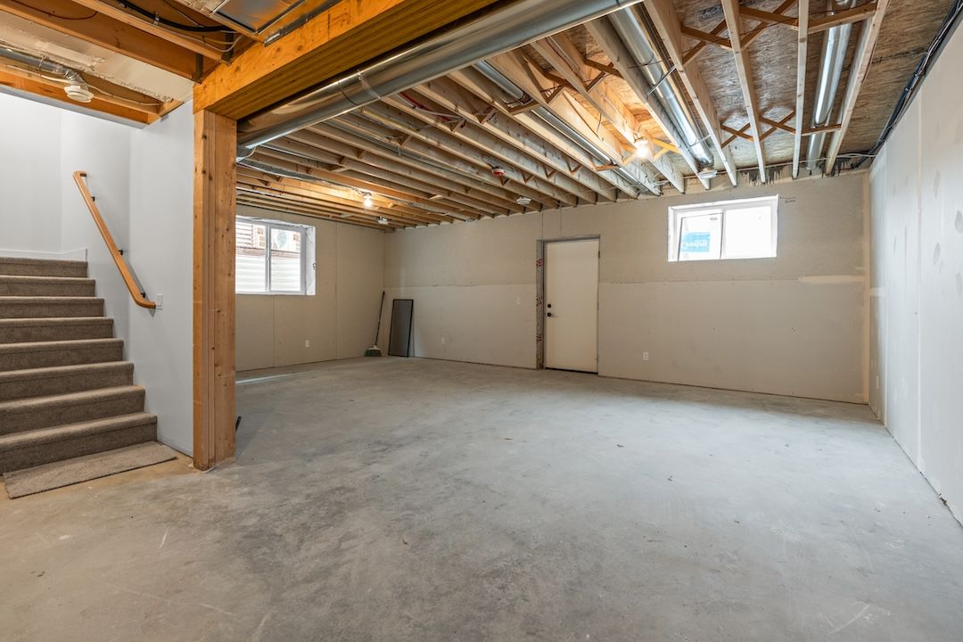 Unfinished lower level in a similar Wesmont home