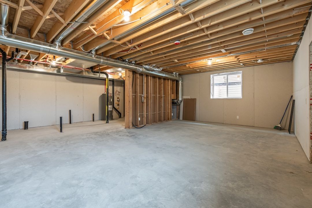 Unfinished lower level in a similar Wesmont home