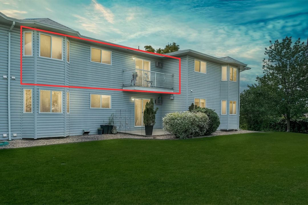 Building exterior with #206 outlined on the upper floor