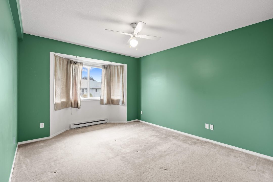 Primary bedroom with bay window