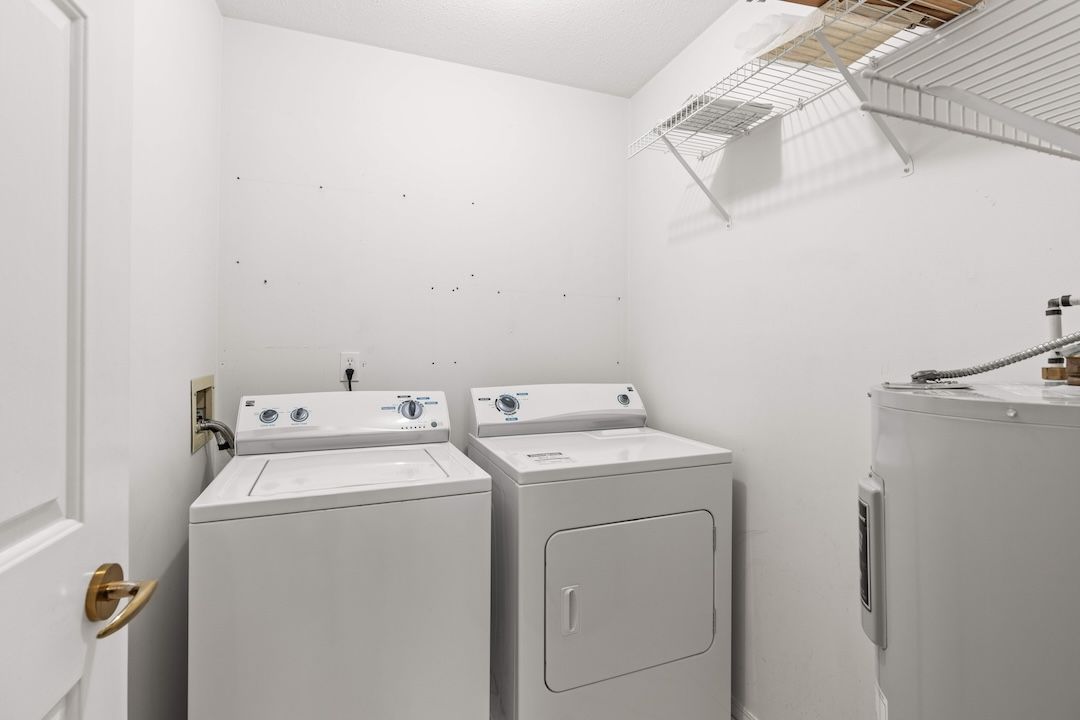 Laundry room with washer and dryer