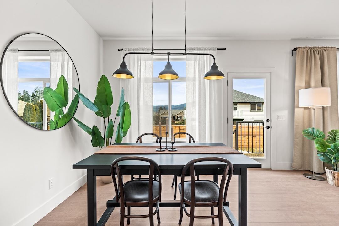 Similar home: Dining area with door to the deck