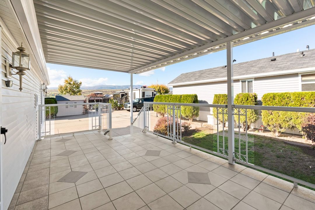 Covered deck with glass railings