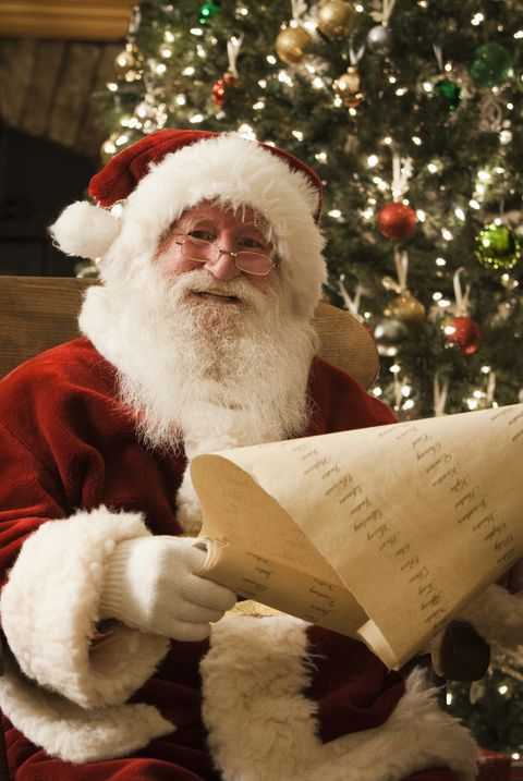 santa claus checking his naughty and nice list