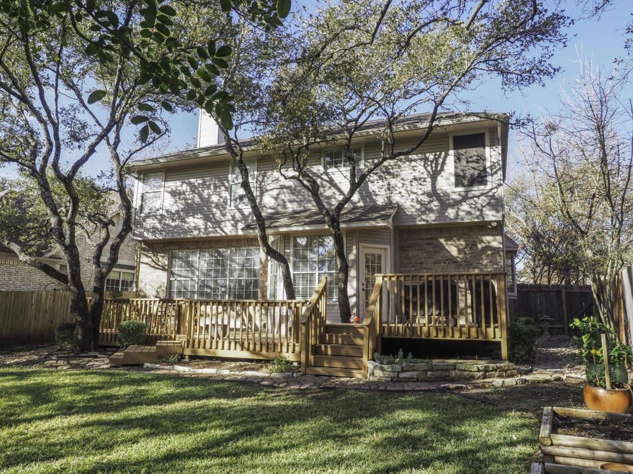 wrap around porch on a beautiful lot on Canyon Creek