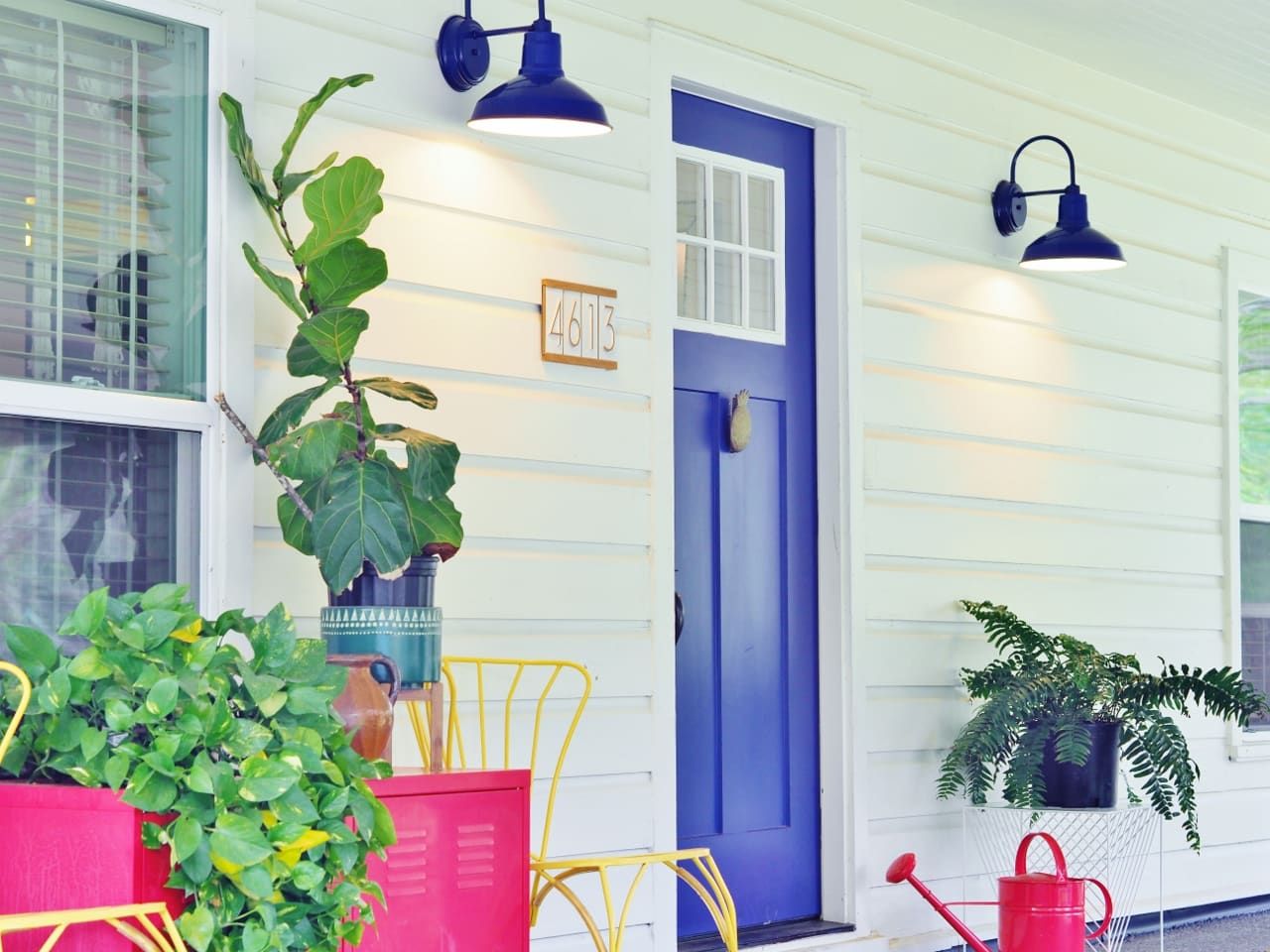 Paint the exterior an appealing color like this blue front door