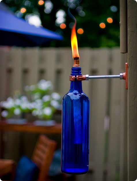 Light up some wine bottle tiki torches